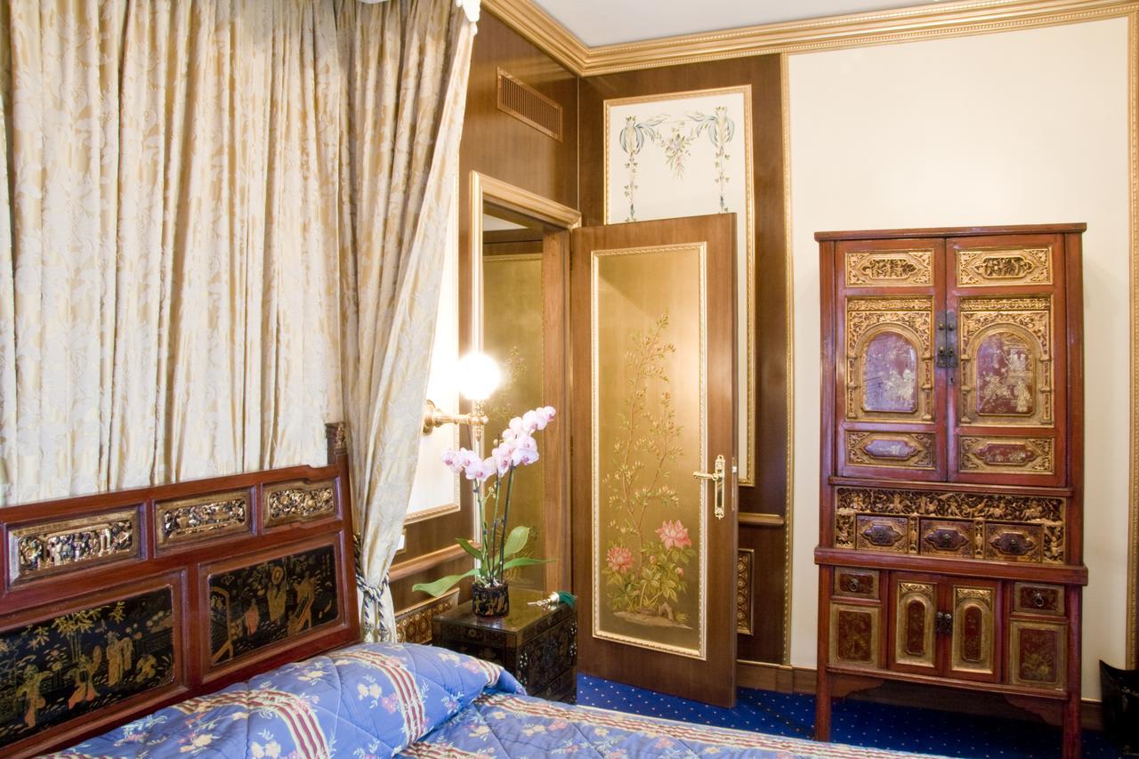 Grand Hotel Des Iles Borromees & Spa Stresa Exterior photo A room at the hotel